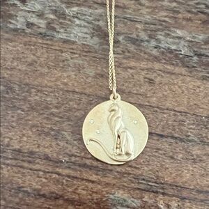 Gold cat pendant